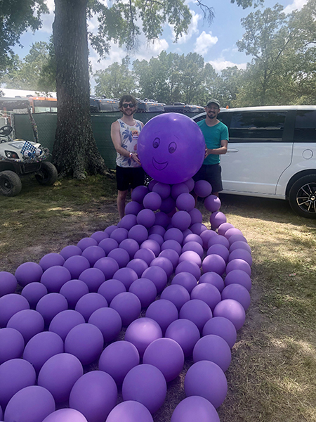 a purple octopus made out of baloons